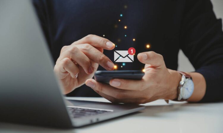 phone in hand with messaging icon animation