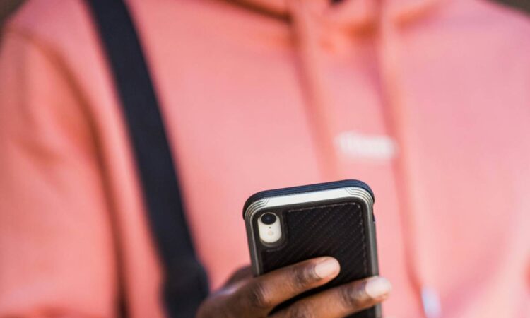 Person messaging on their phone
